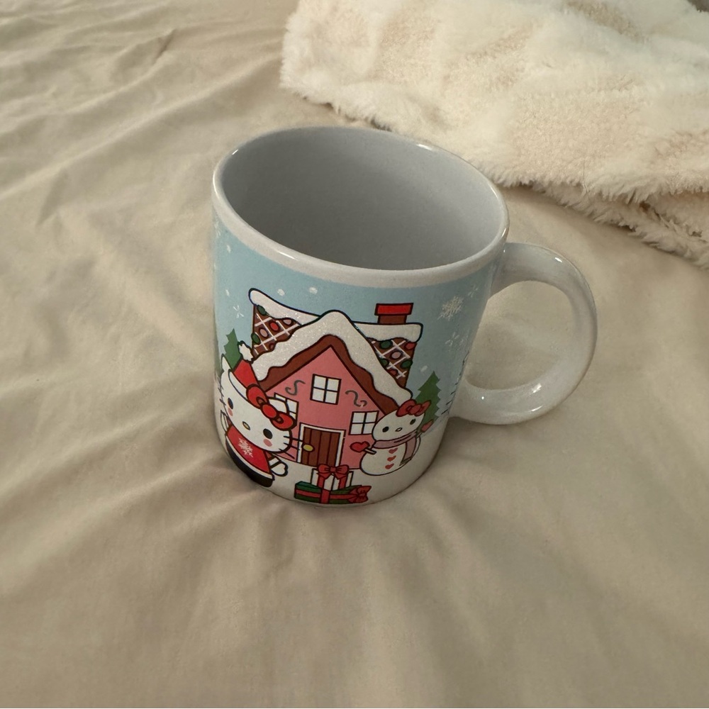 Hello Kitty Holiday Mug with Snowman and Gingerbread House Design